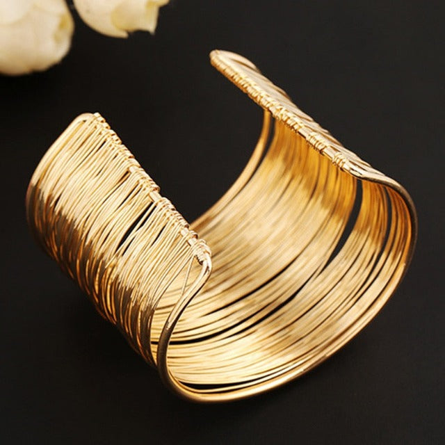 Pulsera rígida gruesa oro y plata para mujer oro