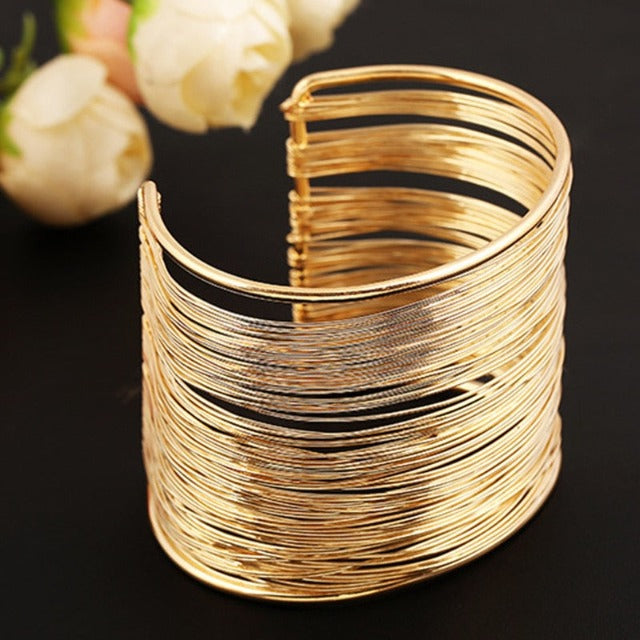 Pulsera rígida gruesa oro y plata para mujer oro