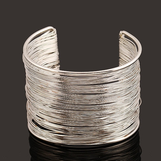 Pulsera rígida gruesa oro y plata para mujer plata