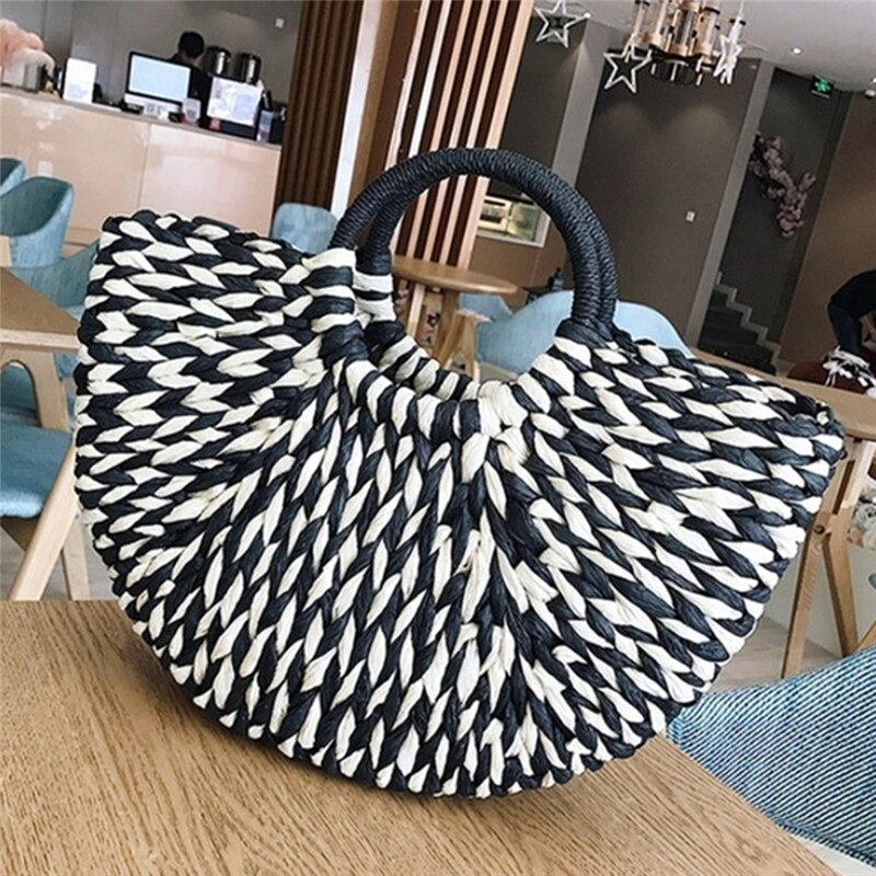 Bolso de mano de ratán negro y blanco 
