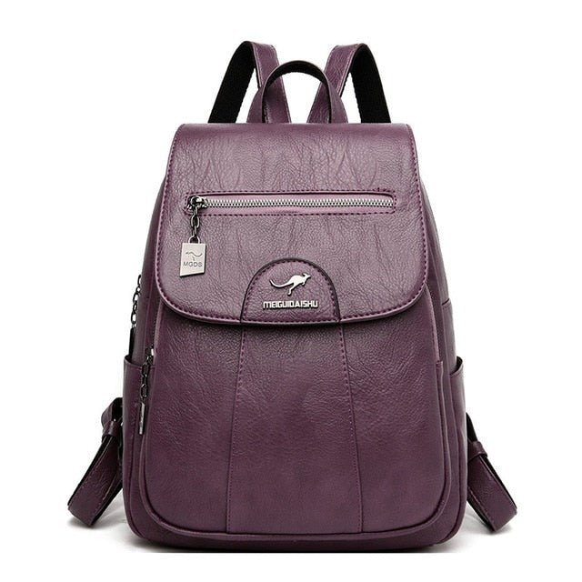 Bolso mochila de cuero para mujer morado